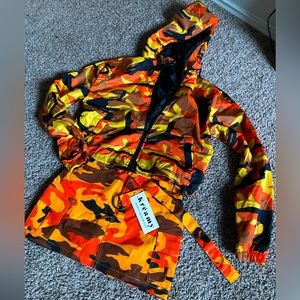 Two piece skirt and windbreaker jacket set. Skirt size (S) Windbreaker size (M)